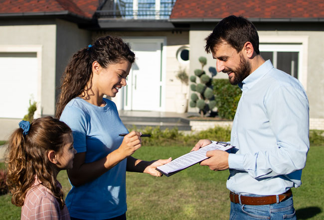 Homeowner Signing A Contract